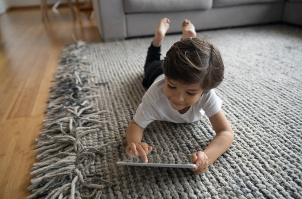 Girl lying on rug | Larry Lint Flooring