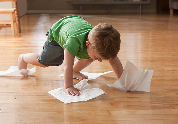 Kid cleaning floor | Larry Lint Flooring